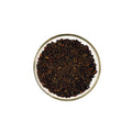 Everlastea Organic Earl Grey loose leaf tea in a glass bowl.