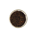 Everlastea Organic English Breakfast loose leaf tea in a glass bowl.