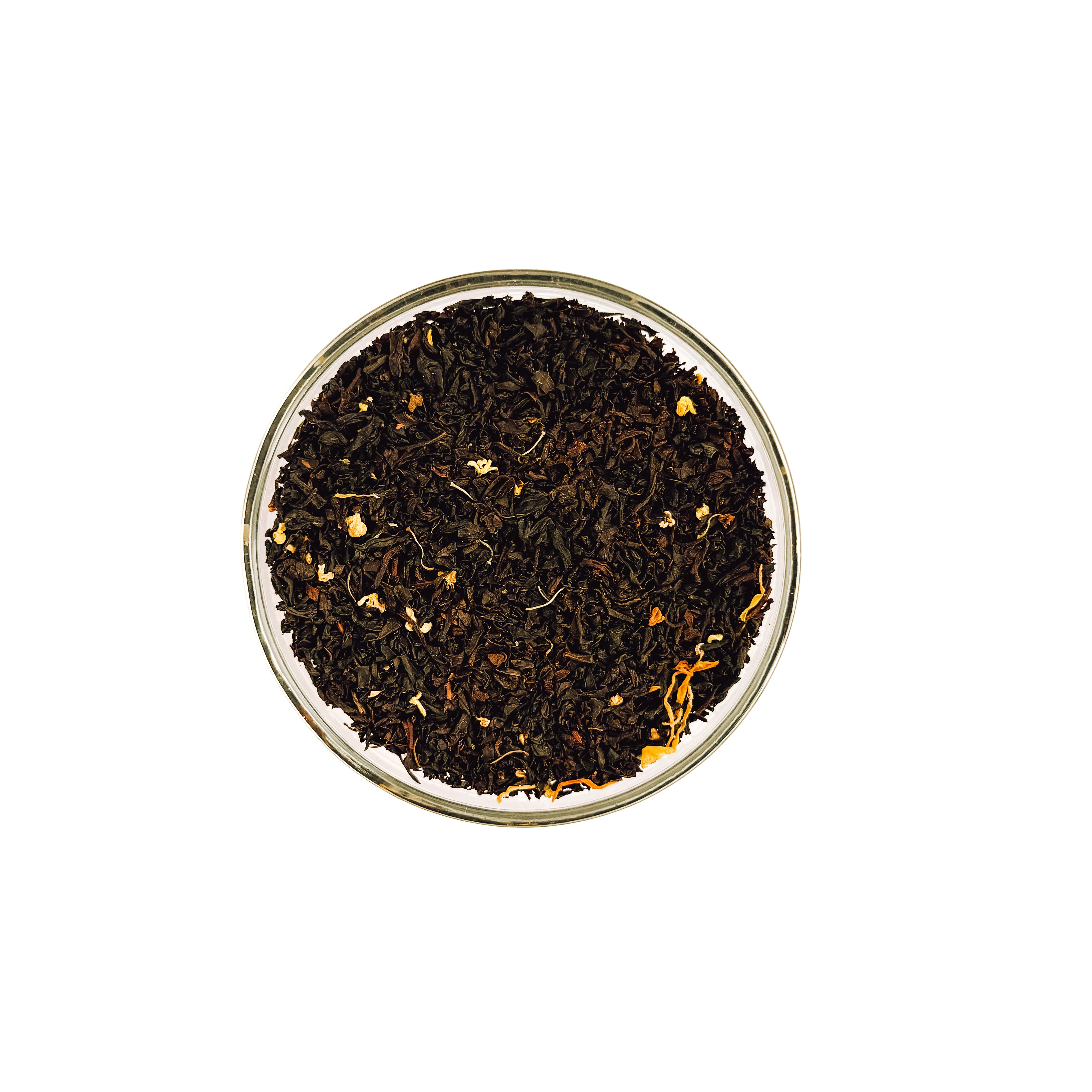 Everlastea Organic black mango loose leaf tea in a glass bowl.