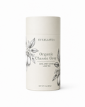 A tall, cylindrical white container of Everlastea Organic Classic Grey leaf tea, featuring black text and delicate botanical illustrations on the front label, set against a clean white background.