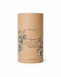 A cylindrical kraft paper tea canister for Everlastea Organic First Pour loose leaf tea, featuring black text and gray floral illustrations, set against a plain white background.