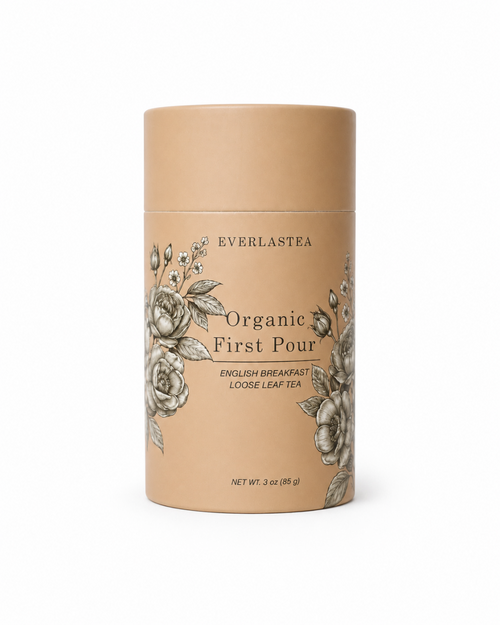 A cylindrical kraft paper tea canister for Everlastea Organic First Pour loose leaf tea, featuring black text and gray floral illustrations, set against a plain white background.